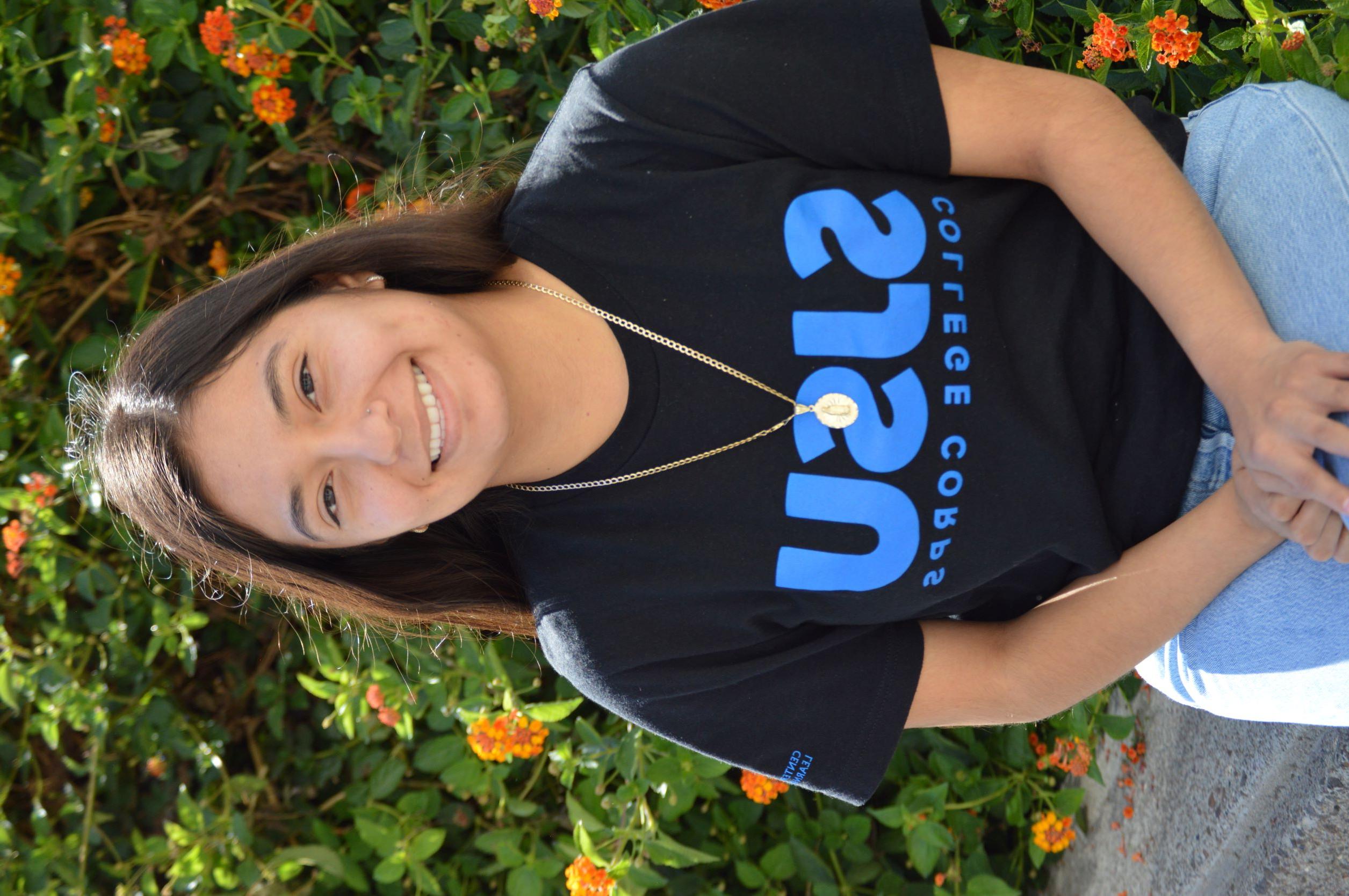 Alejandra Arellano in black CC shirt