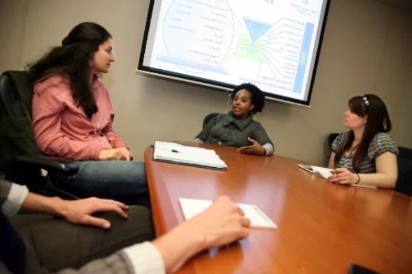 Curriculum committee reviewing courses for approval