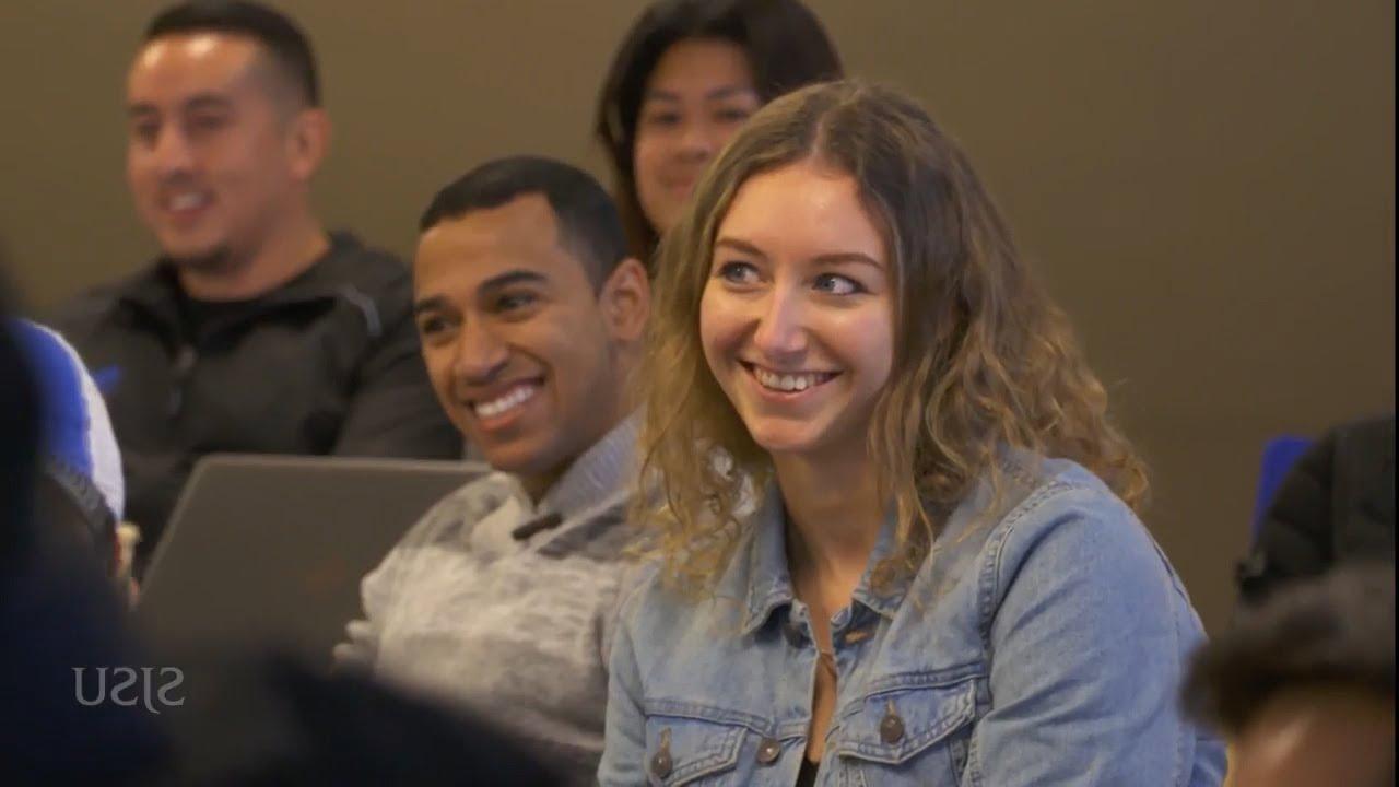 Video thumbnail preview of a smiling university student looking forward