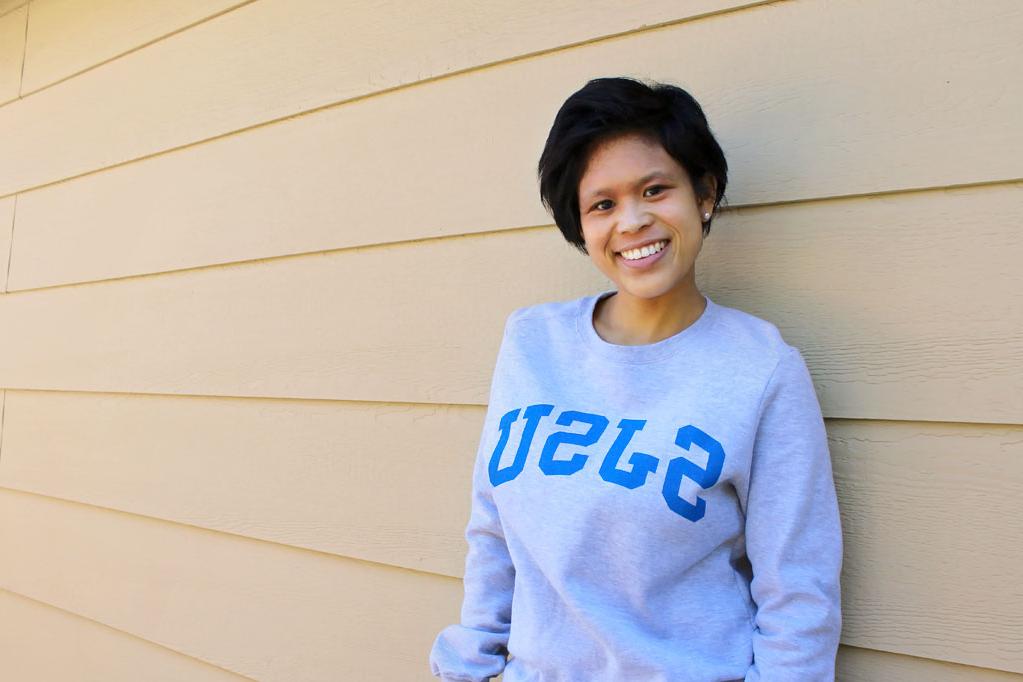 Image of student, Erin Enguero, in 菠菜网lol正规平台 sweater.